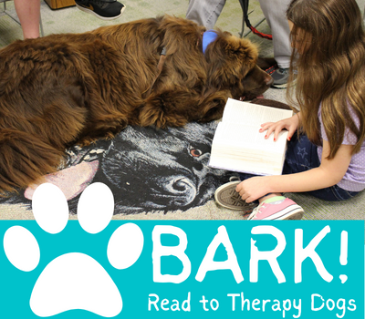 A girl reads to a large brown dog. Text reads Bark Read to Therapy Dogs
