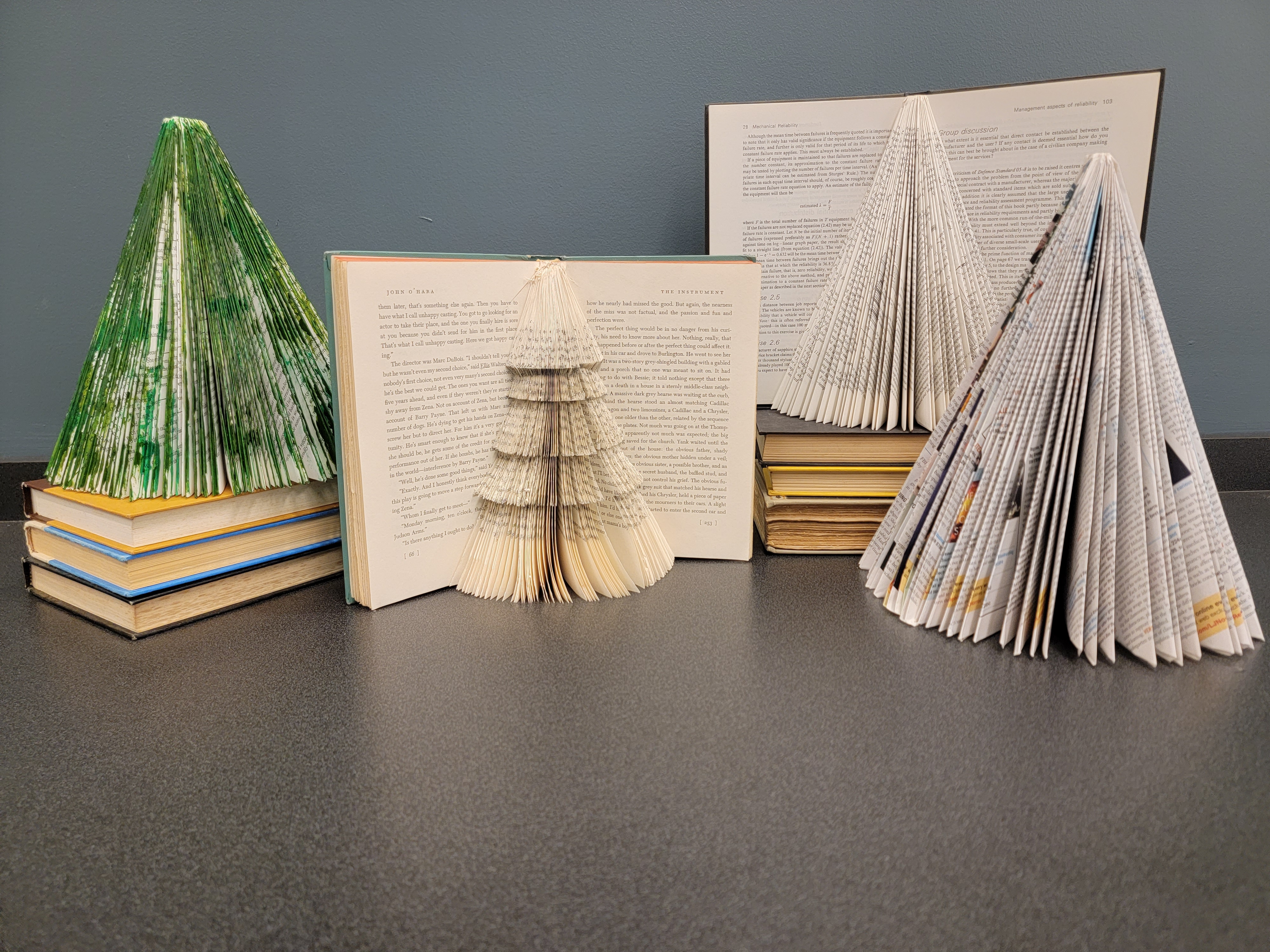 several trees made from books