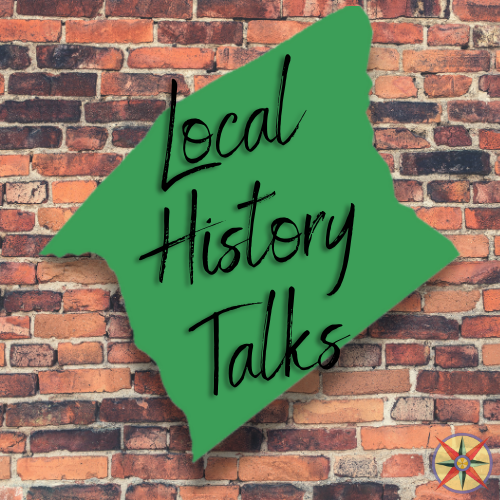 Local History Talks Logo - 'Local History Talks' written on top of a green outline of Anderson County on top of a background of a brick wall.
