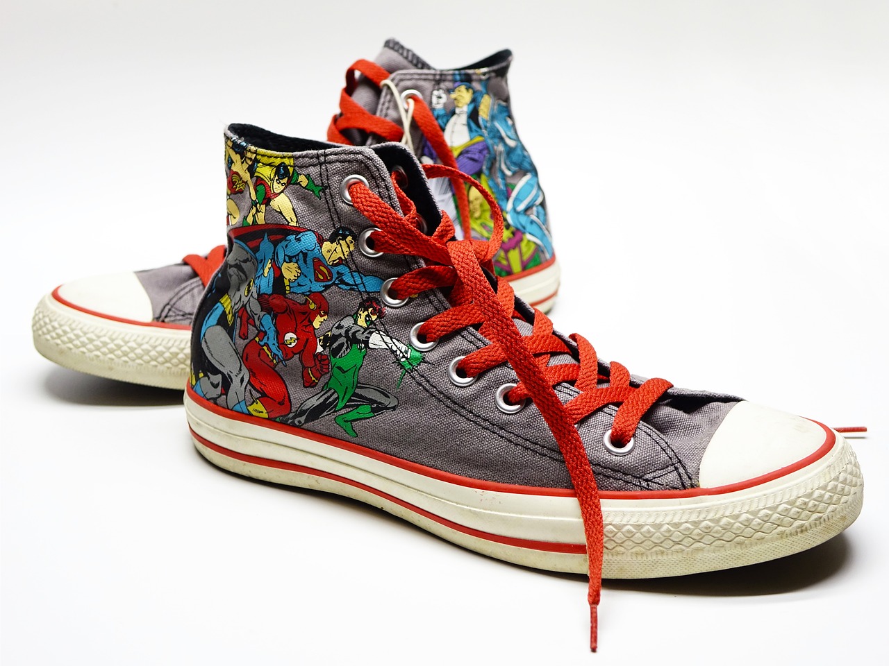 converse decorated with classic superheroes